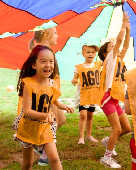 kids in parachute in Grange Park, AGO camp